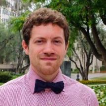 Characterization and modeling of large hydrocarbon/air premixed turbulent flames using direct numerical simulations