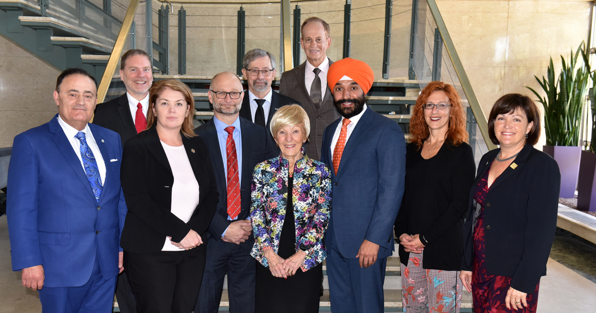 The Honourable Navdeep Bains, federal Minister of Innovation, Science and Economic Development, with Members of the Parlament and officers of Polytechnique Montréal